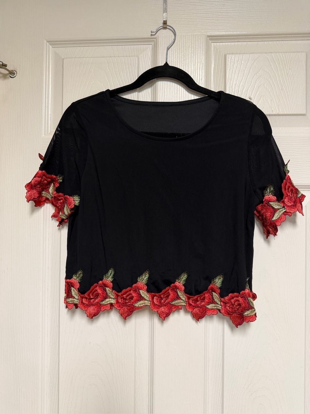 Black size large crop top with red rose trim